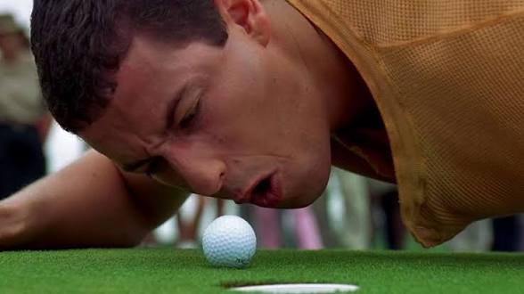 The lads, mid-putt